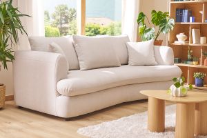 Canapé convertible déhoussable 3-4 places design haricot en tissu effet velours beige clair SACHA