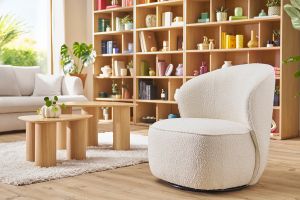 Fauteuil design pivotant en tissu effet laine bouclée blanc AMBER