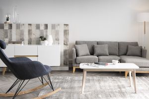 Canapé d'angle droit déhoussable scandinave 4 places en tissu gris clair et bois clair OSLO