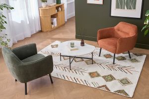 Fauteuil design en tissu effet velours texturé terre brûlée et métal noir LAURENS