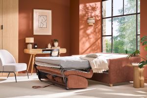 Canapé convertible 3 places en tissu effet velours terre brûlée et bois clair avec matelas 18 cm SKANDY