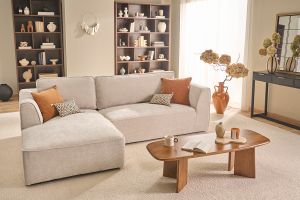Canapé d'angle gauche design en tissu effet velours texturé beige 3 places GRAMMY