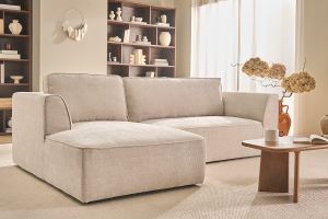 Canapé d'angle gauche design en tissu effet velours texturé beige 3 places GRAMMY