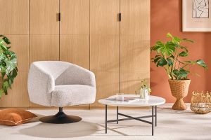 Fauteuil pivotant en tissu effet bouclette beige et métal noir BOWIE