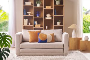 Canapé convertible 2 places en tissu effet velours texturé beige LEON