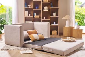 Canapé convertible 2 places en tissu effet velours texturé beige LEON