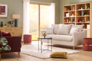 Canapé convertible scandinave 3 places en tissu effet velours beige et bois clair LOUISE