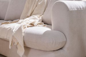 Canapé déhoussable 3-4 places design haricot en tissu effet velours beige clair SACHA