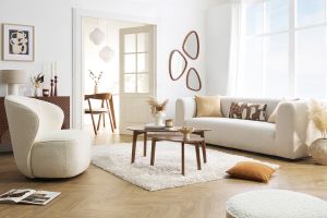 Fauteuil design pivotant en tissu effet laine bouclée blanc AMBER